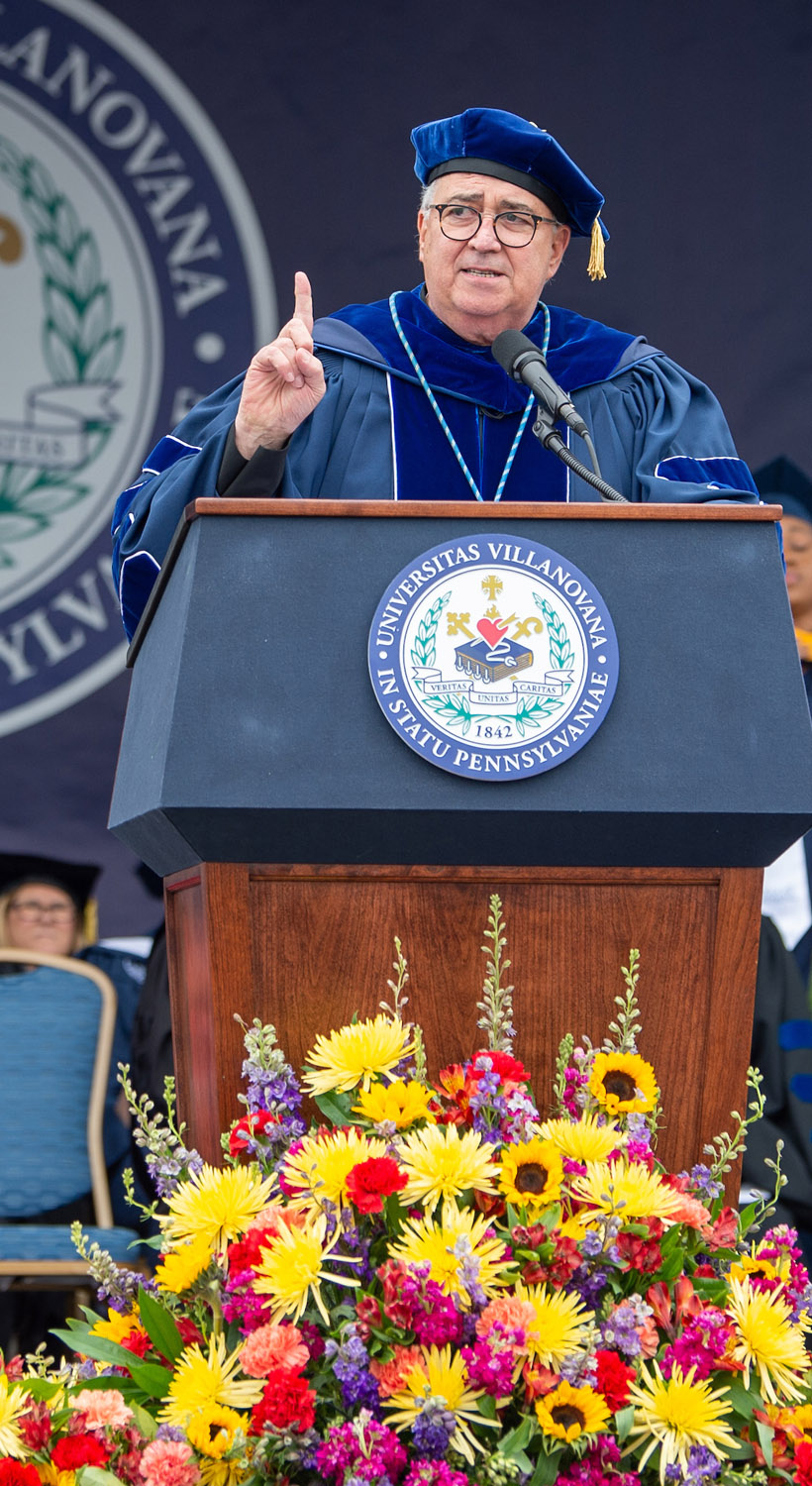 Father Peter Donahue speaking at Commencement