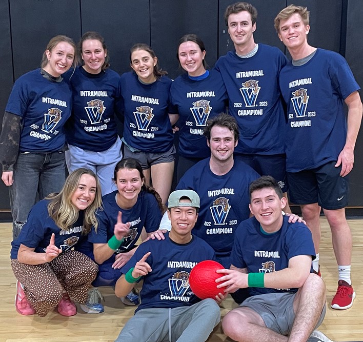 Students posing for dodgeball champion photo